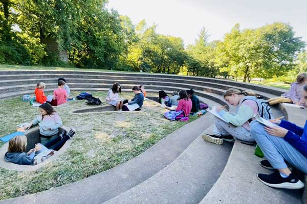 Students reading outside